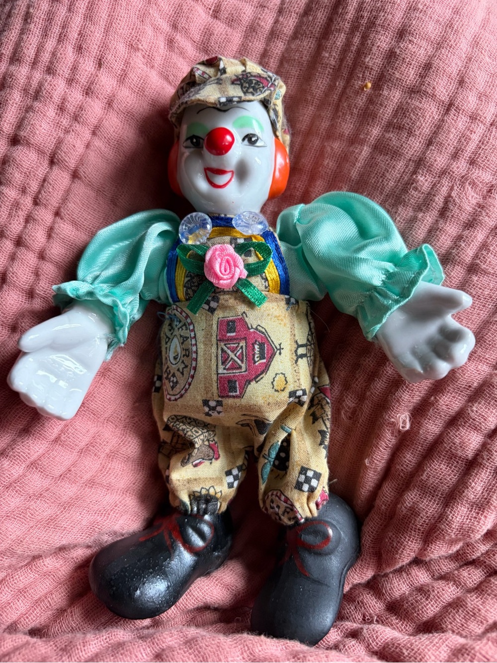 Porcelain Clown Doll with Turquoise Outfit and Patterned Overalls